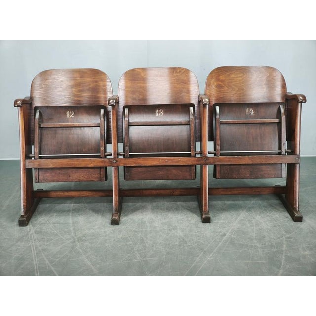 A rare and authentic three-seat cinema bench from 1920s Czechoslovakia, executed in the manner of Thonet. Crafted from...
