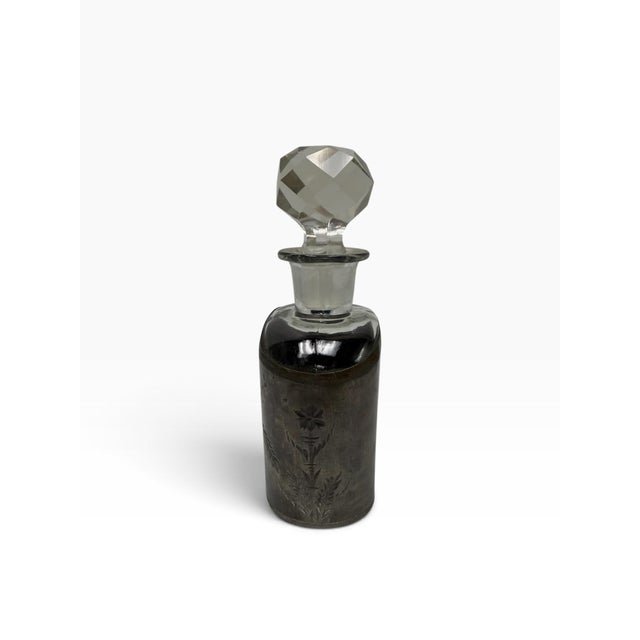 Add a sophisticated antique accent to your bar cart or vanity with this beautiful Art Deco era glass liquor decanter....