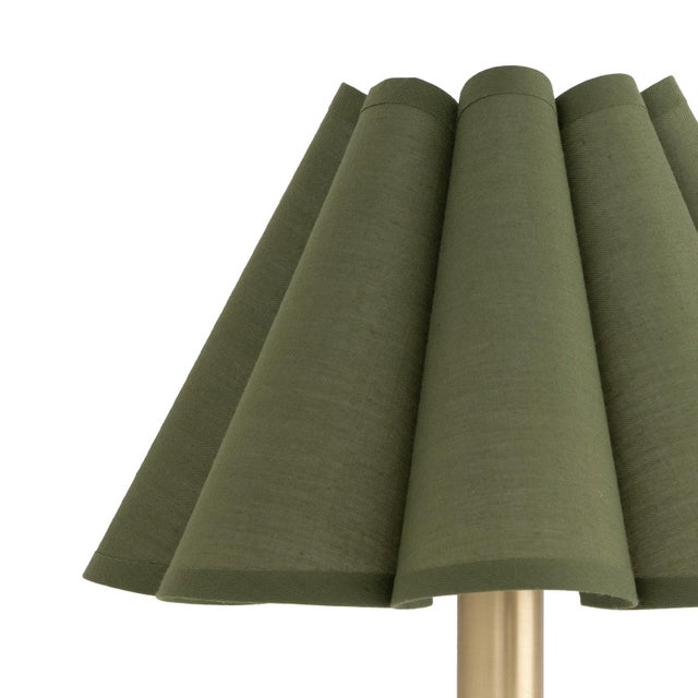 The Polly Wall Sconce brings an air of refined elegance with its single scalloped shade, casting a warm and comforting...