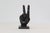 Invite the feeling of Zen to any space with this beautiful Peace Sign hand sculpture, crafted from high-quality resin....