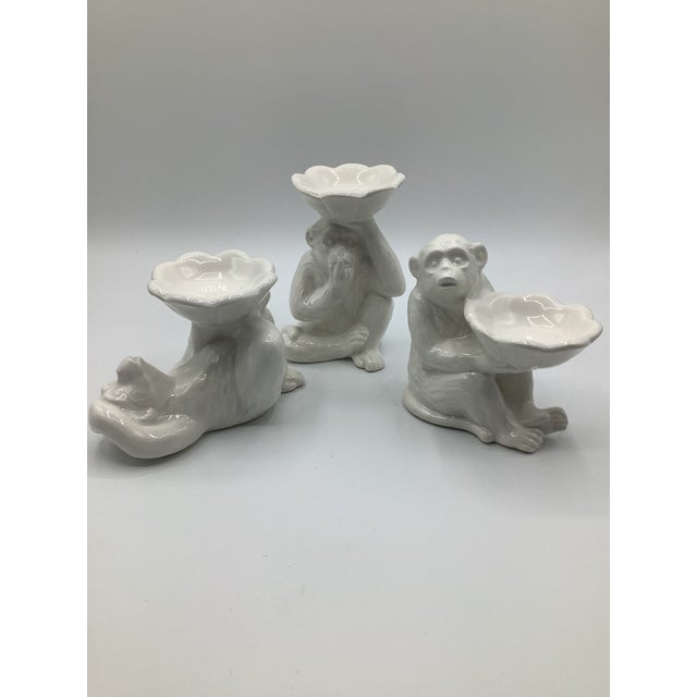 A fantastic set of 3 vintage Fitz and Floyd whimsical white ceramic monkey votive holders. They are made in Japan and in...