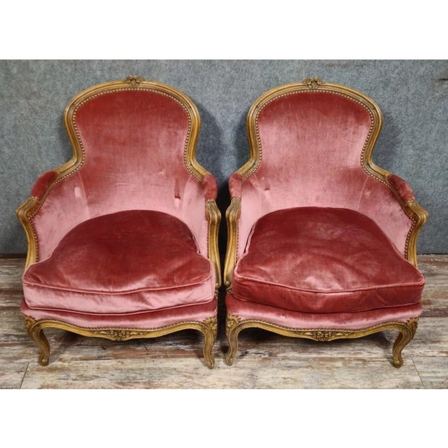 Pair of louis xv style cabriolet armchairs – carved wood – pink velvet – h 83 cm an elegant pair of louis xv style...