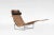 PK24 chaise lounge designed by Poul Kjærholm and manufactured by Fritz Hansen. Featuring a hand-woven wicker seat and a...