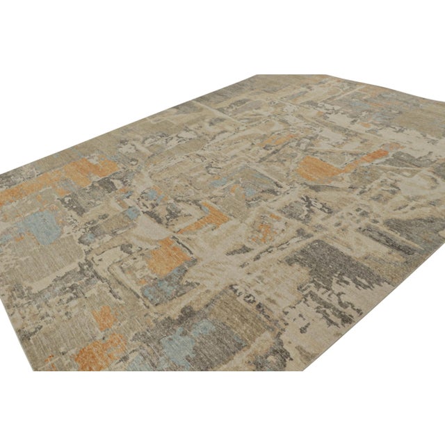 Hand-knotted in wool, this 9x12 modern rug is a new addition to the Homage Collection by Rug & Kilim. On the Design: This...