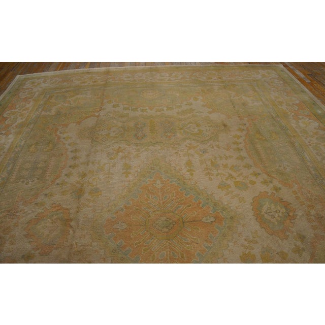 Early 20th Century Turkish Oushak Carpet ( - 300 x 435 ) Antique Oushak Turkish Ivory 1930s Rug, Circa Date: 1930s. This...