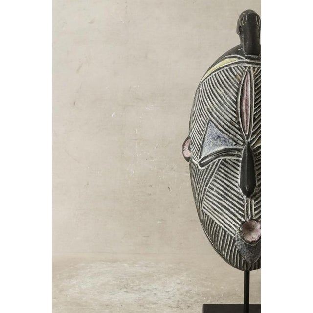 The Songye mask is an extraordinary and culturally significant art piece originating from the Songye people of the...