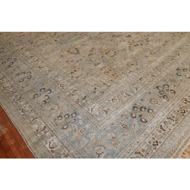 An early 20th-century Persian Doroksh oversize square Rug. A true show stopper of a rug, this antique Persian Doroksh...