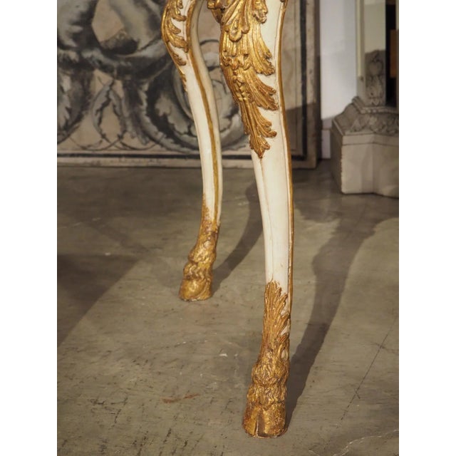 Console tables are beautiful, graceful tables that also serve a practical purpose. These tables are aligned against a...