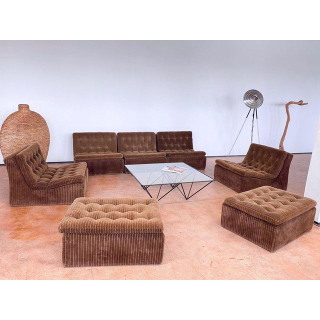 DUX International modular seating group consisting of 7 individual elements in a pleasant and soft corduroy velvet fabric....