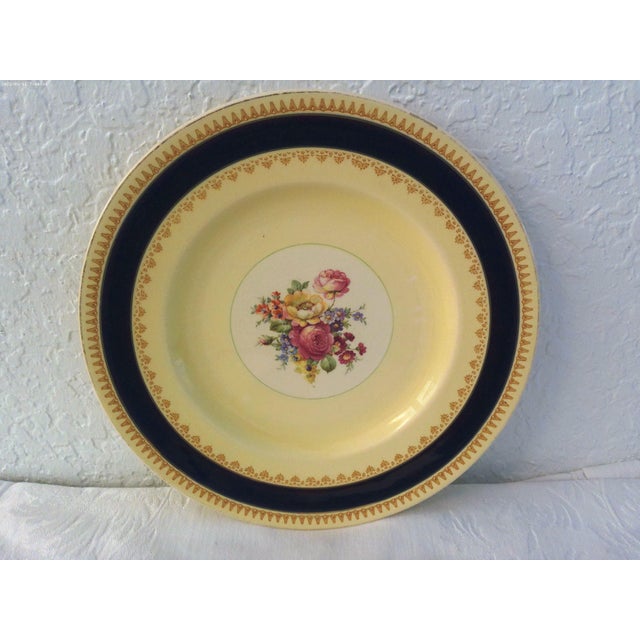 Pretty set of six nicely matched vintage porcelain dinner plates in complimentary floral patterns. Set consists of one...
