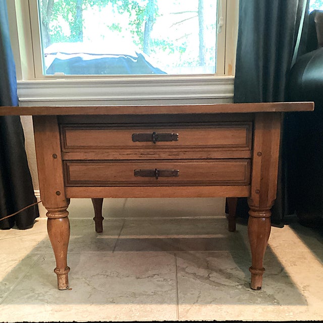 Add warmth to your living space with this exceptional pair of 1960s traditional end tables. Crafted from solid maple,...