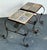 This evocative pair of vintage Italian accent tables captures the rustic elegance and enduring craftsmanship of mid-20th...
