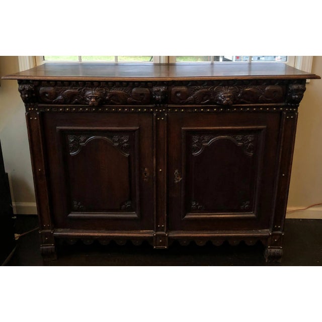 This Early 19th-century French Renaissance Buffet is a spectacular version of a fine cabinetry technique from the 1800s....