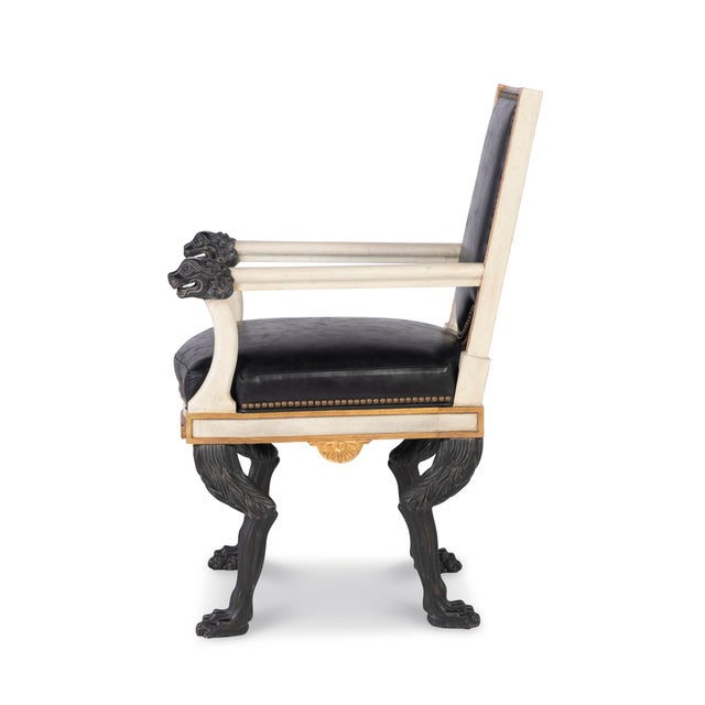 This 19th-century inspired Italian Neoclassical armchair exudes whimsy and grandeur with its distinctive design. The chair...