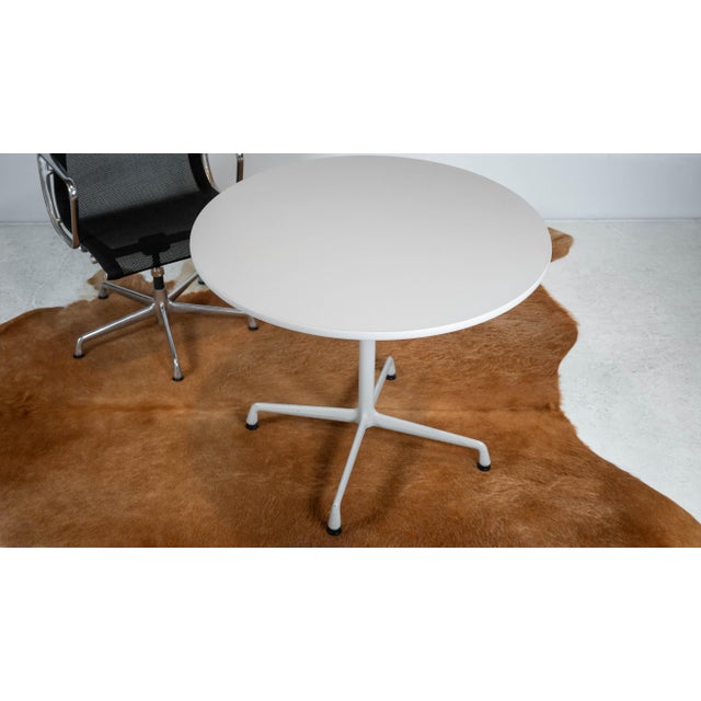 Charles and Ray Eames for Herman Miller Aluminum Group dining table or Eames Contract Base Round Table, circa 1997. Gray...