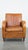 This sleek, characteristic and timeless vintage sheep leather design armchair in beautiful warm cognac colors. This...