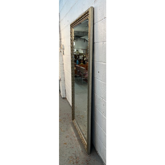 Add timeless elegance and old-world charm to your home with this stunning large ornate vintage mirror. Featuring an...