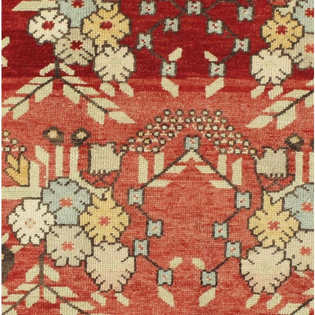 Character, tradition, and artistry come together in this stunning hand-knotted vintage Turkish Oushak rug, featuring...