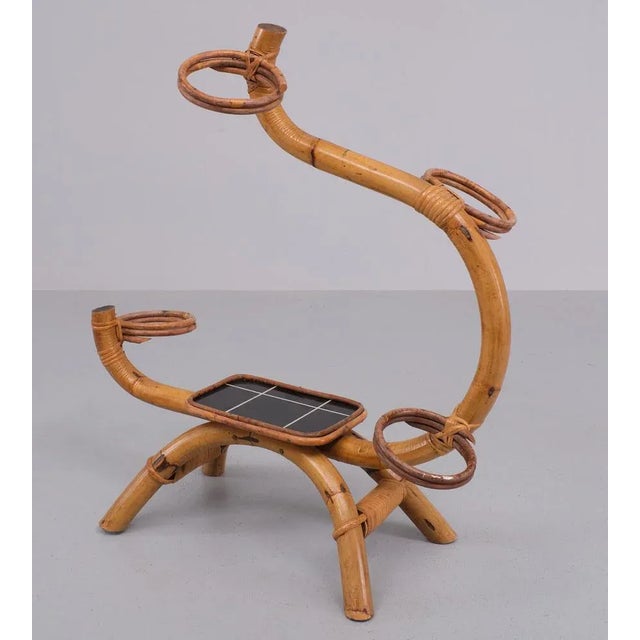 Very nice vintage plant stand. Handmade with Bamboo and Wicker so decorative .There is place for 4 hanging pots (12 cm...