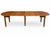 This antique solid oak extension dining table is a beautiful example of classic American craftsmanship, offering both...