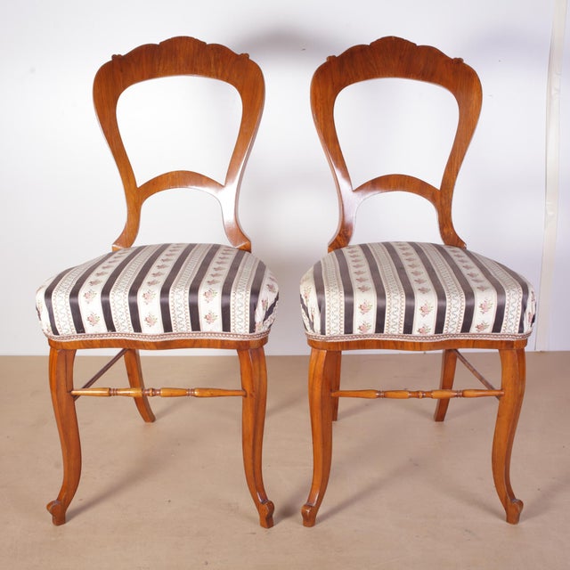 These antique chairs date from the late Biedermeier period, approximately between the 1850s and 1880s. The chairs were...