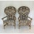 Vintage pair of Ficks Reed fan back rattan chairs. Woven high "peacock" style backs with curved arms capped in brass. Come...