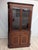 Corner Display Cabinet in English Walnut This English-style corner display cabinet is finished with mahogany veneer. The...