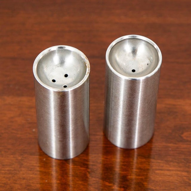 Salt and pepper shaker set by Arne Jacobsen for Stelton. Made from stainless steel. Unmarked examples.