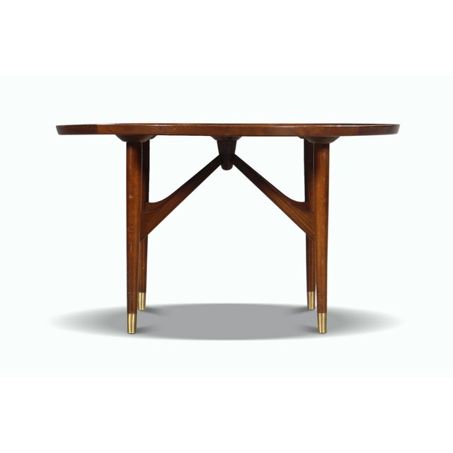 Origin: Denmark Designer: William Watting Manufacturer: Unknown Era: 1950s Materials: Nutwood, Beech Measurements: 38.75″...