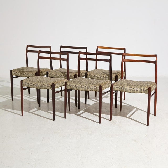 The ‘Anne’ rosewood dining chair designed by Johannes Andersen for Uldum Møbelfabrik in the 1960s. The sculptural details...