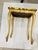 This wood table is painted ivory with gold leaf floral accents on top 14 x 17 x 20 h nice accent table size