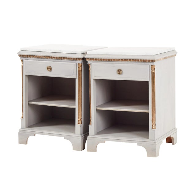 Gustavian style bedside tables with white marble top. Made in second half of 20th century. Greay color with gold...