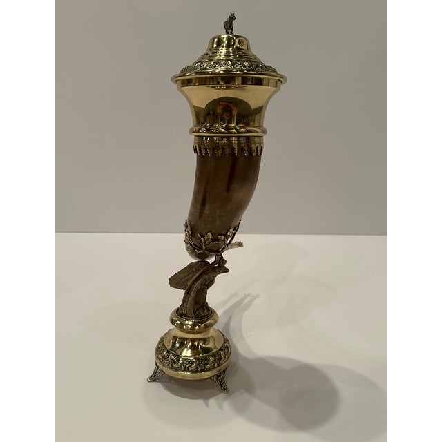 Stunning 19th century horn and brass covered trophy cup having incredible details such as eagle at the base and cow on the...