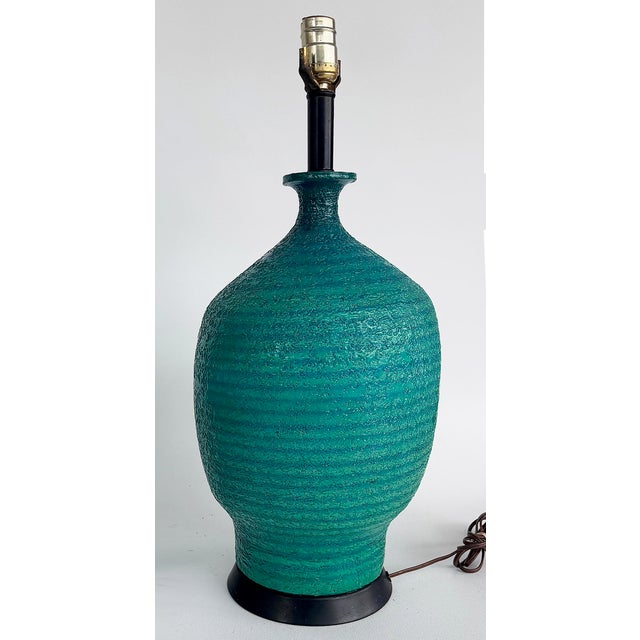Mid-century Modern Textured Glazed Pottery Table Lamps, Pair Offered for sale is a pair of mid-century ceramic pottery...