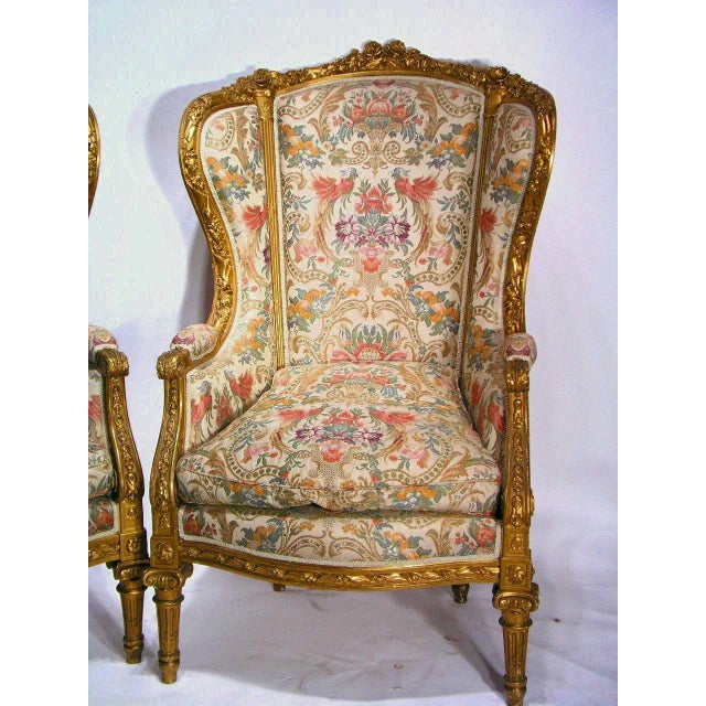 An exquisite fine matching pair of gold gild Louis XVI Armchairs in excellent condition. The ART INTERIOR of ITALY SIGNED...