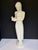 This elegant white porcelain figurine is titled "Innocentia" (also known as "Die Unschuld" or "Innocence"). It is a...