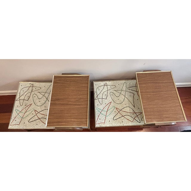 Rare 1950s atomic mosaic step-end side table with a sculptural two-tier silhouette and striking abstract tile top under...