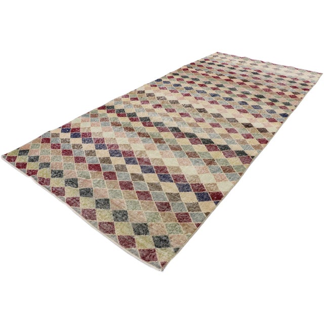 distressed vintage Turkish Sivas rug with Rustic Mid-Century Modern style. This hand knotted wool distressed vintage...