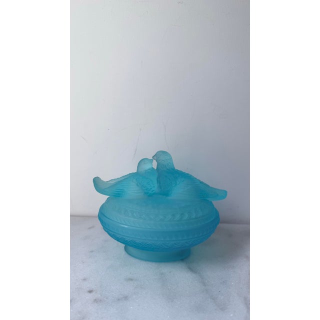 Add a touch of mid-century elegance to your home decor with this beautiful Vintage Westmoreland Blue Satin Glass Covered...
