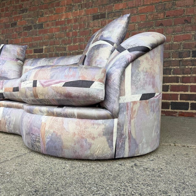 This is a postmodern loveseat designed possibly by Vladimir Kagan but definitely manufactured by Directional. It features...