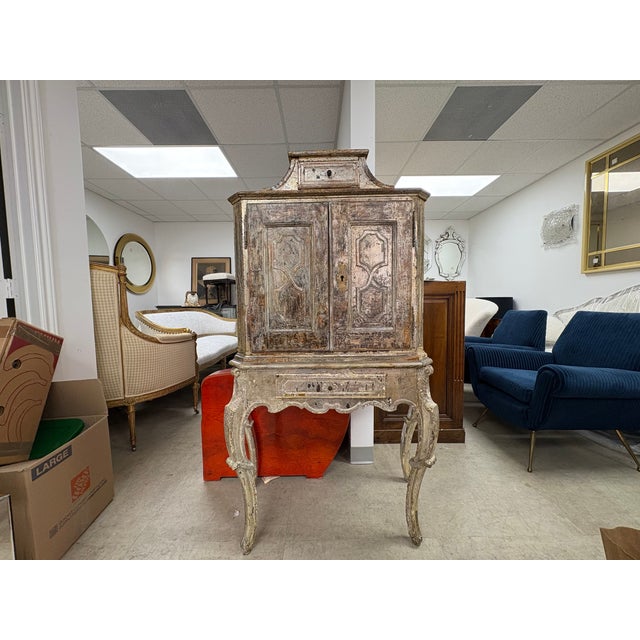 18th Century Venetian Baroque Silver Giltwood Cabinet. Offered is a lovely 18th century Venetian Baroque two part silver...