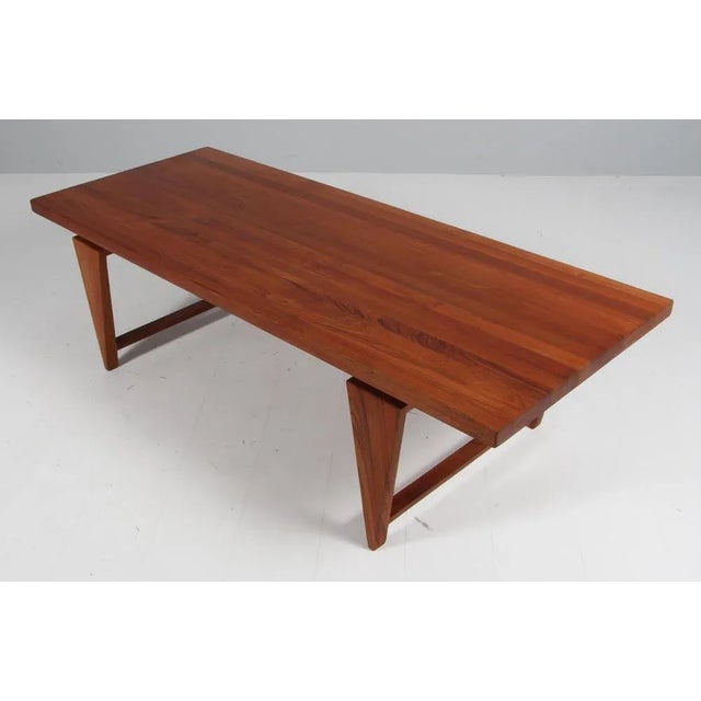 Illum Wikkelsø Coffee Table in Solid Teak. Made by Mikael Laursen, Aarhus. This piece is attributed to the mentioned...