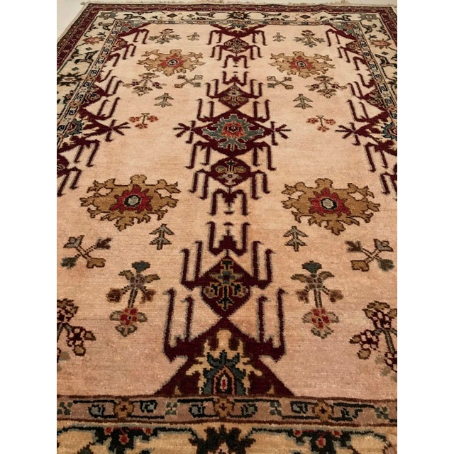 This handmade vintage rug is unused.
