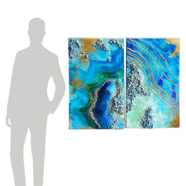 Bring the beauty of ocean geodes into your home with this stunning large diptych. Each panel measures 20" x 40", creating...