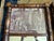 A pair of antique mirrors accented with antique toile