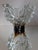 A sculptural ice glass vase in the Finnish tradition of the 1970s, built in two layers: a core of deep amber-brown glass,...