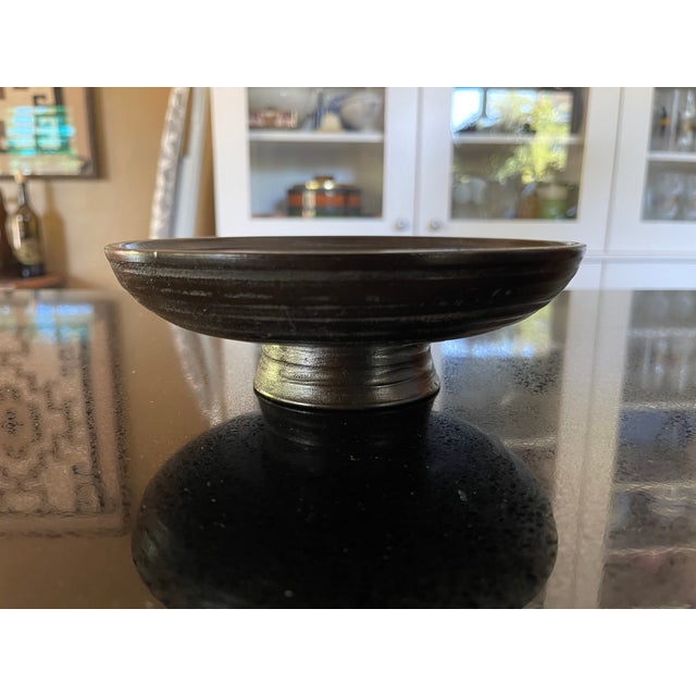 It is called Koma lacquer because the colored lacquer painted in a concentric circle style resembles a koma(spinning top)....