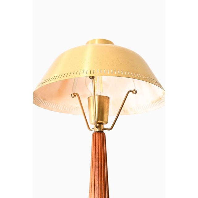 This rare table lamp, designed by hans bergström and produced by asea in sweden, is a refined embodiment of mid-century...