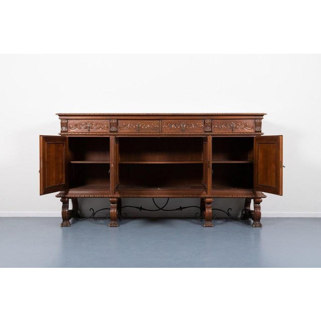 Spectacular carved wood cabinet with the motives of Don Quixote de la Mancha and Sancho Panza from Spanish epic novel by...