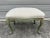 Italian Louis XV Style Painted And Gilt Bench. Offered is a lovely Italian painted and gilt wood bench or ottoman. The...